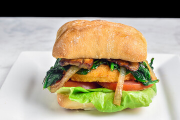 chicken   sandwich  top with onions, mushrooms and spinach