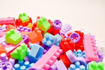 Various colored toy blocks on a white background, educational toys for children