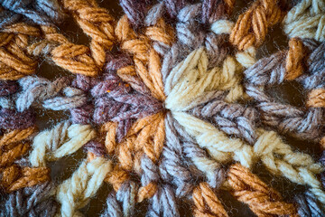 Intricate Crochet Yarn Textures in Earthy Tones Macro View