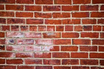 Red Brick Wall with Mortar Texture Close-Up at Eye Level