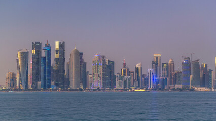 Obraz premium Doha downtown skyline day to night timelapse, Qatar, Middle East