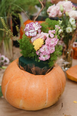 Creating a floral composition in a pumpkin. Making decor with your own hands.