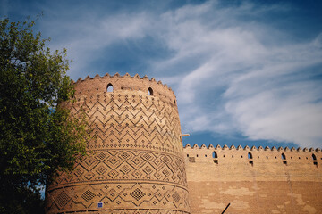Historic Brick Tower with Intricate Patterns