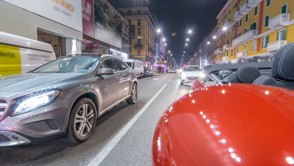 Car moves at fast speed at the night avenue timelapse hyperlapse drivelapse.