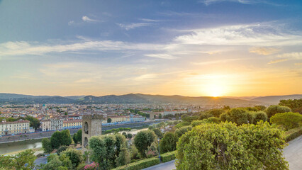 Fototapeta premium Sunrise top view of Florence city timelapse with arno river bridges and historical buildings