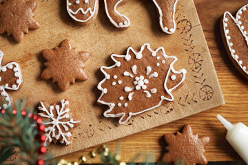 Hedgehog shaped homemade gingerbread Christmas cookie decorated with white icing