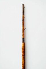 Fototapeta premium Cork-handled fishing rod on white background.