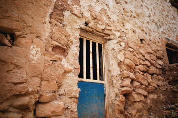 Weathered Stone Wall with Rustic Blue Door