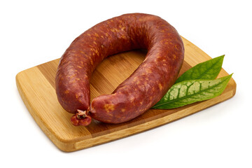 Smoked pork sausage ring, isolated on white background. High resolution image.