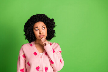 Photo of pretty young girl look skeptical minded empty space wear strawberry print pink outfit...