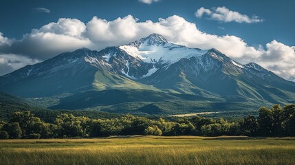 Fototapeta premium Peak Majesty: Snowcapped Mountain Range Panorama