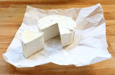 Vegan cheese. Coconut camembert. Dairy-free plant-based cheese analogue.
