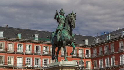 Statue of Philip III timelapse hyperlapse at Mayor plaza in Madrid in a beautiful summer day, Spain