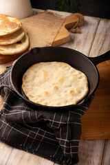 Bazlama. Turkish flatbread whose main ingredients are wheat flour, yeast, water and salt, delicious and versatile homemade recipe very popular in the Middle East.