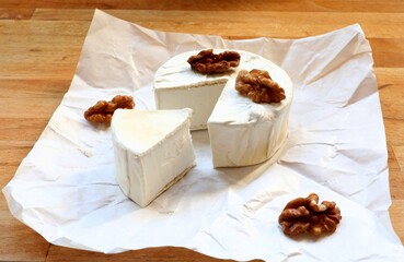 Vegan cheese. Coconut camembert. Dairy-free plant-based cheese analogue.