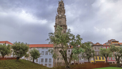 Bell tower of the Clerigos Church in cloudy blue sky background timelapse hyperlapse