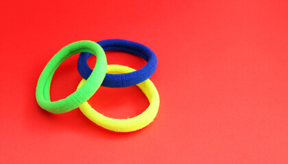 Colorful elastic to tie hair rolls and falls with the rest