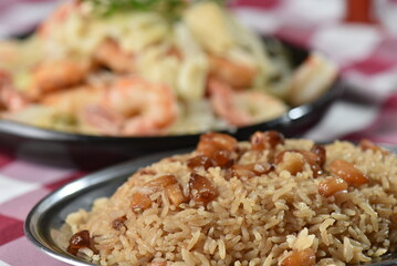 codfish typical Portuguese dish baked cod with onion garlic peppers and potatoes rustic Portuguese food salted fish cooked olive oil