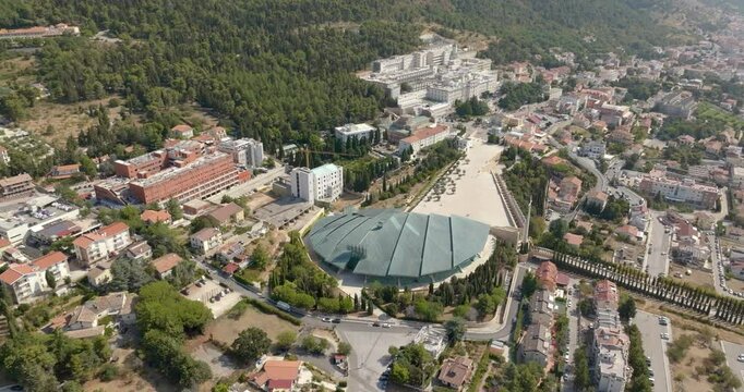 Aerial view of the Sanctuary of Saint Pio of Pietrelcina, also known as Padre Pio Pilgrimage Church, and the hospital Home for the Relief of Suffering located in San Giovanni Rotondo, Puglia, Italy. 