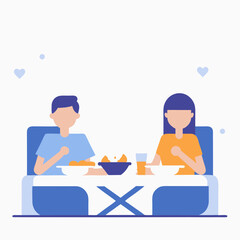 A man and a woman are sitting at a table eating. The man is eating a bowl of food and the woman is eating a plate of food. They are both drinking from cups. Scene is casual and relaxed