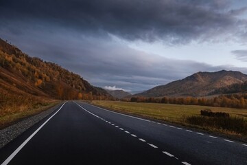 Naklejka premium highland road in the twilight.