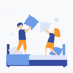 Two children are playing with pillows on a bed. Scene is playful and lighthearted