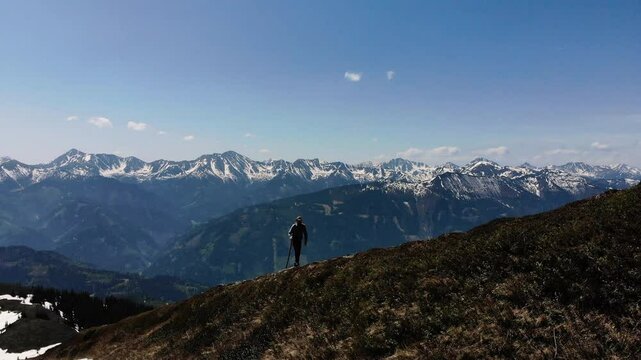 a man hikes in the mountains