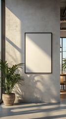 Blank poster frame in a modern office with concrete walls