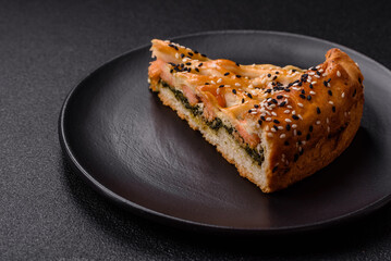 Pieces of quiche with salmon, spinach or broccoli, salt and spices