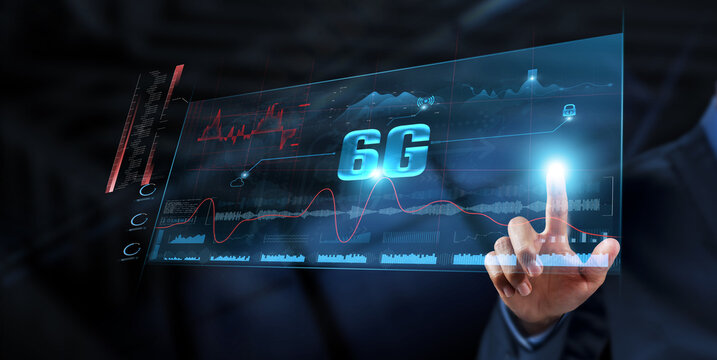 6G Technology: Businessman analyzes data strategy with graph on digital screen. Ultra-fast connectivity, AI integration, real-time data processing, IoT expansion, enhanced security, network efficiency