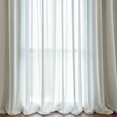 White sheer curtains with natural light flowing through window in minimalist room