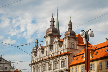 Obraz premium Beautiful old building with a dome, an old landmark in the center of Prague, the capital of the Czech Republic. Architecture photography.