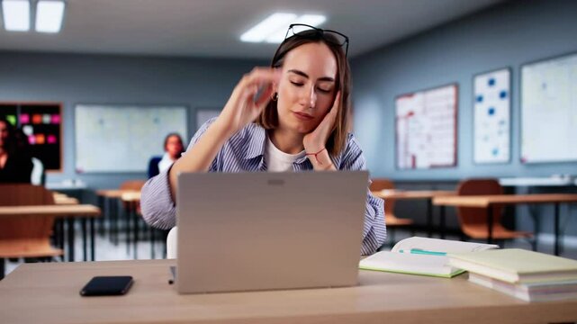 Bored Girl In Classroom Using Computer Technology