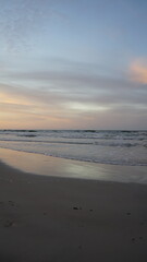 Sunset on the beach by the sea