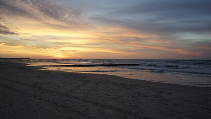 Sunset on the beach by the sea