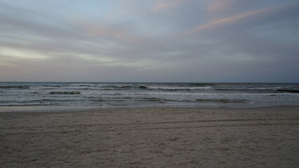 Sunset on the beach by the sea