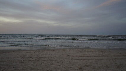 Sunset on the beach by the sea
