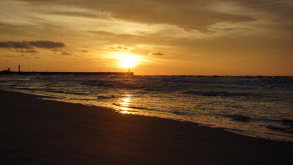 Sunset on the beach by the sea