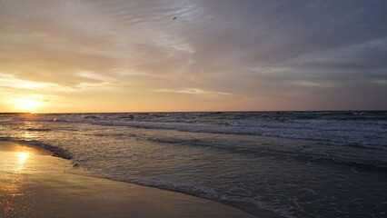 Sunset on the beach by the sea