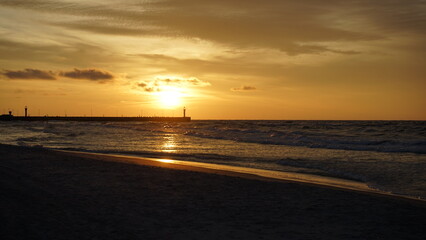 Sunset on the beach by the sea