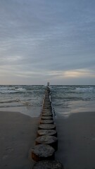 Fototapeta premium Sunset on the beach by the sea