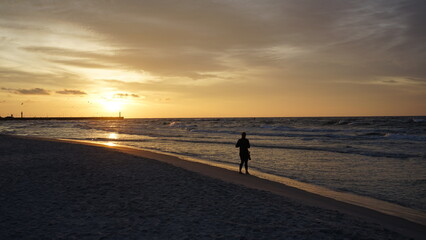 Sunset on the beach by the sea