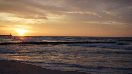 Sunset on the beach by the sea
