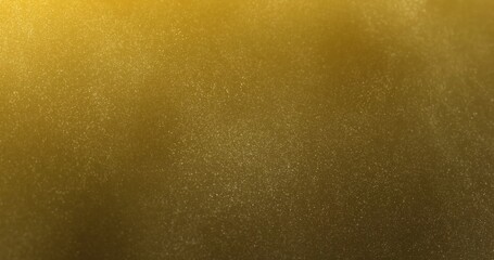 A soft, golden background with a fine, shimmering texture of small sparkling particles. The subtle sparkle and smooth gradient create a luxurious and elegant effect.