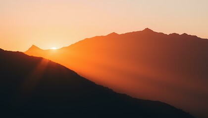Majestic Mountain Range Sunrise Silhouette - Warm Glow Landscape