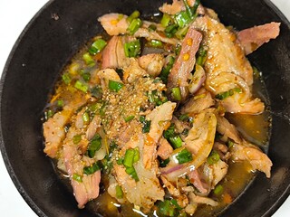 Spicy grilled pork salad. Namtok Moo. Thai street food. Thai northeast food. Isan dish