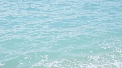 Obraz premium Pure blue turquoise water texture with gentle foam and rolling waves, beauty, relaxation
