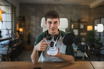 man technology blogger record video blog or v-log of home cctv camera