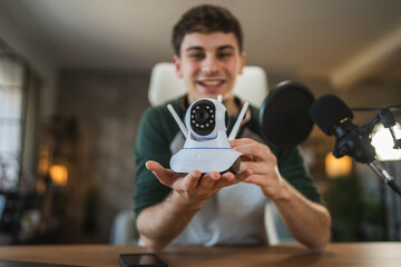 man technology blogger record video blog or v-log of home cctv camera