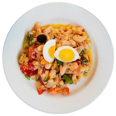 There is plate with braised ragout of tuna fillet and bean tomato. Stewed string beans with fish complement by boiled egg. Isolated over white background